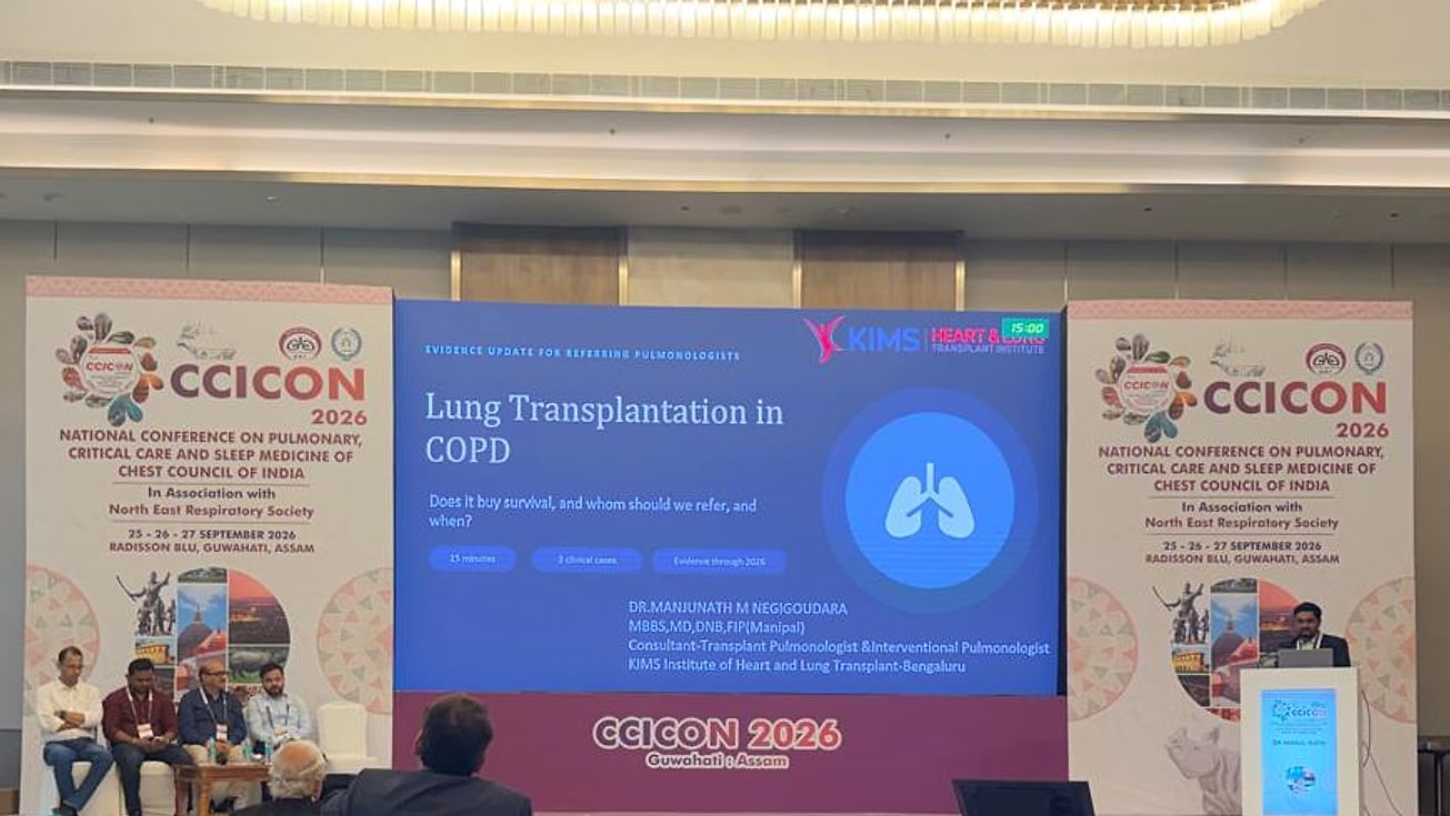 Title slide 'Lung Transplantation in COPD: does it buy survival, and whom should we refer, and when?' with Dr. Manjunath M Negigoudara at the podium, CCICON 2026, Guwahati